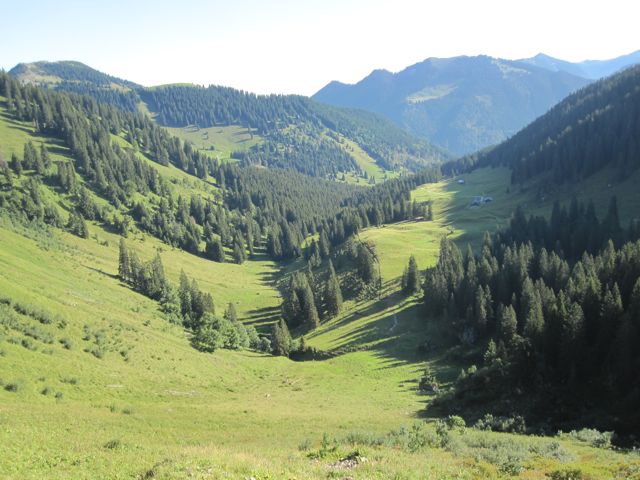 Down the valley back to the farmhouse (upper right of the meadow) where we started.