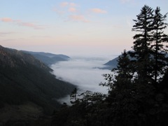 The Spitzingsee is still covered in fog.