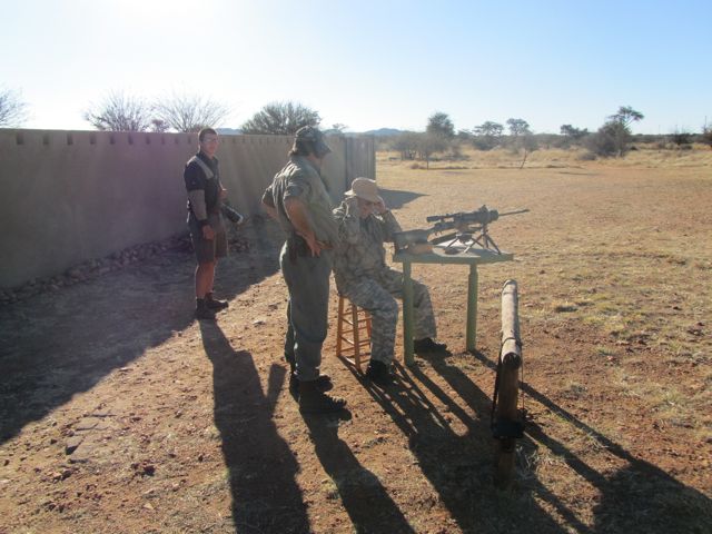 Chuck checks his Winchester Model 70 7mm Remington Magnum