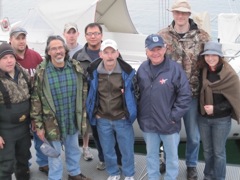 The hearty crew assembles on the dock before boarding our boat.