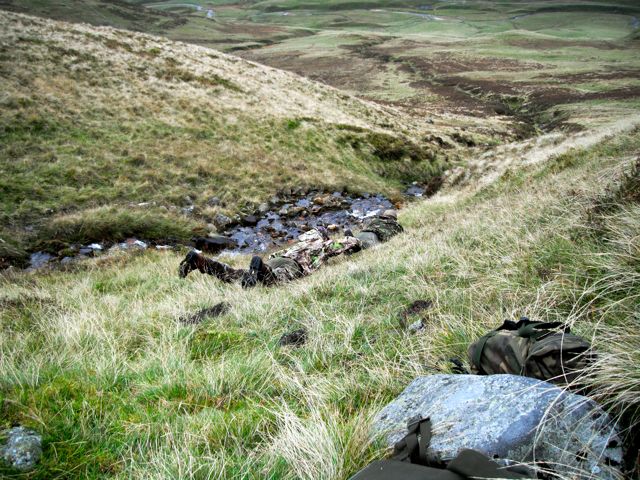 Peter & Phillip crawl down a burn for an approach to a stag calling from the valley below.