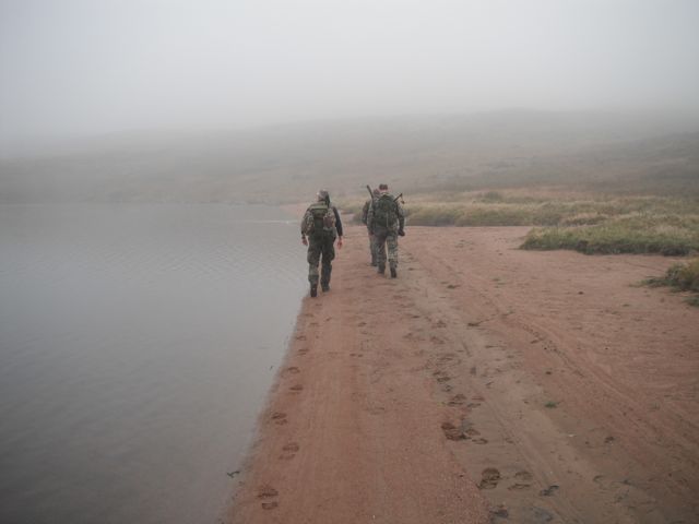 Walking along the loch in the fog