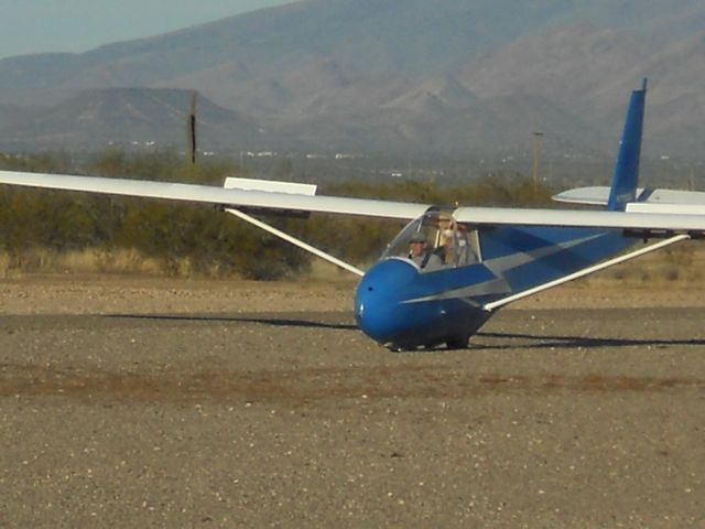 Dad comes in for a landing.  He took it from IP to final nearly to the ground before the instructor pilot took over for the actual landing.