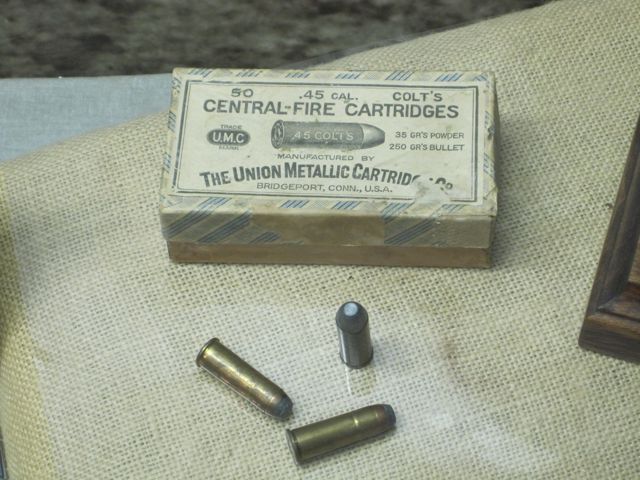 .45 Colt centerfire cartidges.

35 grains of black powder

250 grain lead bullets