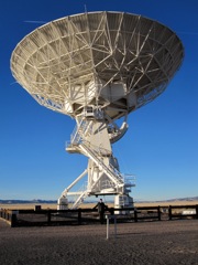 Me up close to the fence, which still keeps you a ways away from the antenna.  These things are HUGE.